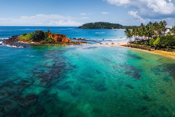 Beautiful shot of the turquoise waters of Mirissa Beach